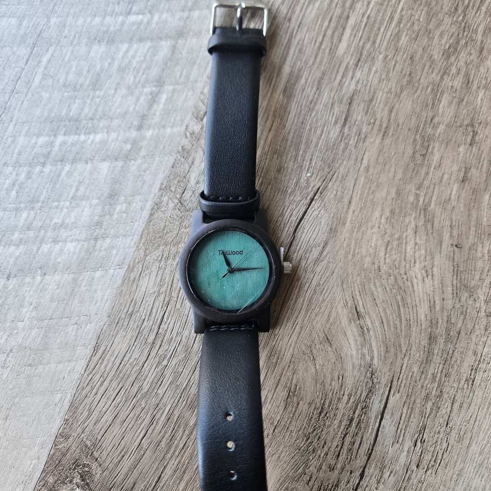 Black Strap Watch with Teal Face
